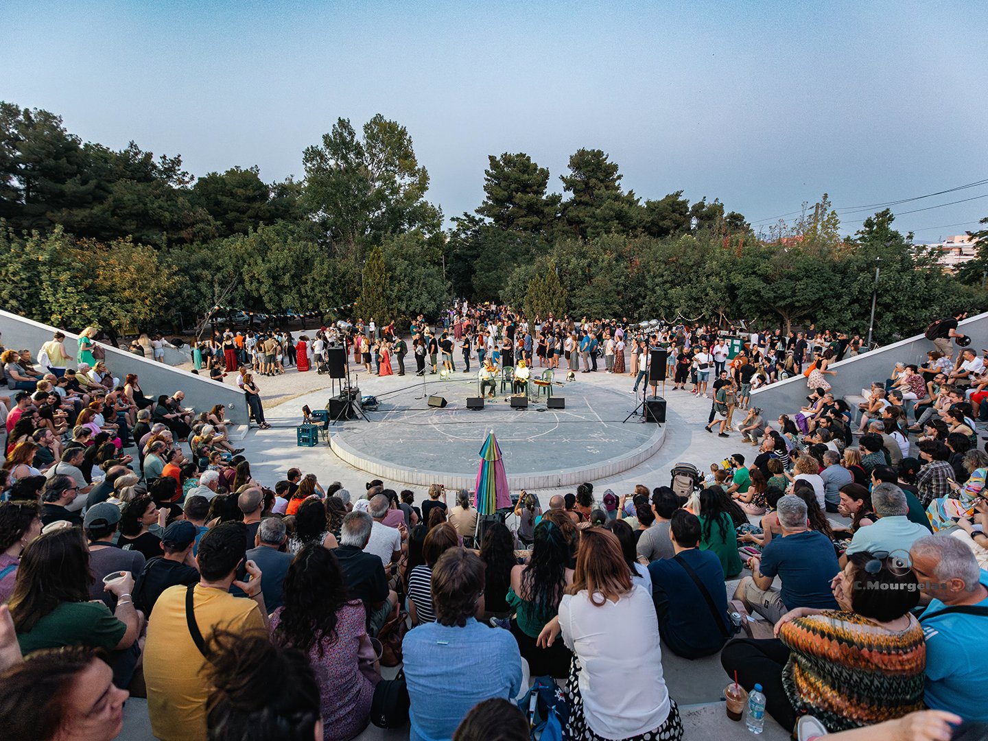 Audience gathered around the outdoor stage at the Athens Irish Festival in Athens, Greece